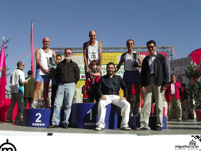 Román Rivero y Manuel Viso con ganadores locales