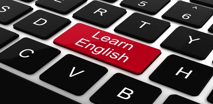 imagen de teclado resaltando learn english, cursos de inglés