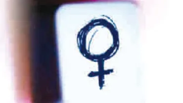imagen de tecla con símbolo de la mujer