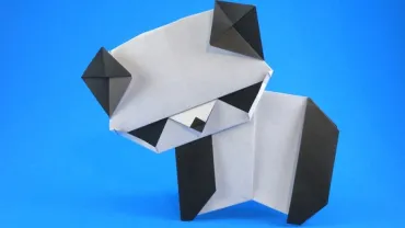 imagen de un oso panda elaborado cn papel con la técnica denominada origami