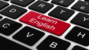 imagen de teclado resaltando learn english, cursos de inglés
