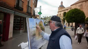 imagen de artista durante el certamen de pintura rápida de Miguelturra